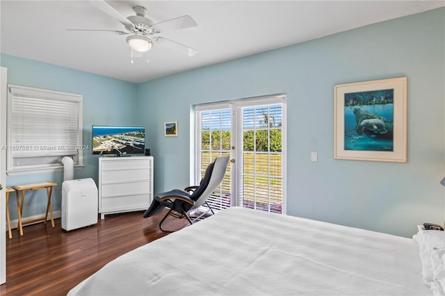 bedroom with ceiling fan and dark hardwood / wood-style flooring