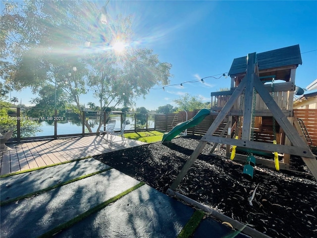 view of playground featuring a water view