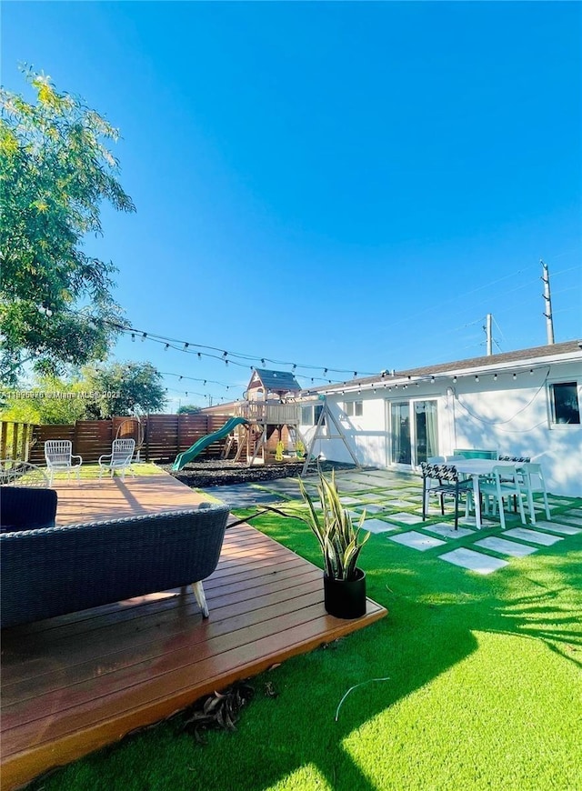 view of yard featuring a playground