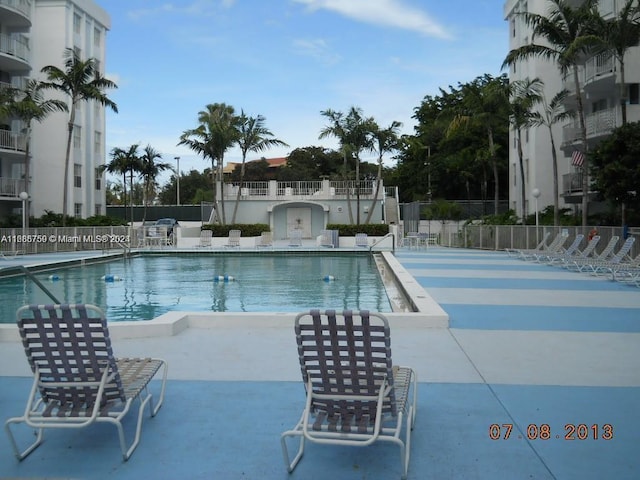 view of swimming pool with a patio