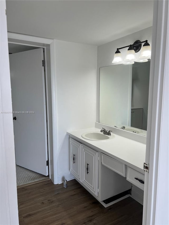 498 NW 165th St Rd Unit D-607, Miami, FL 33169 - bathroom featuring vanity, wood finished floors, and baseboards