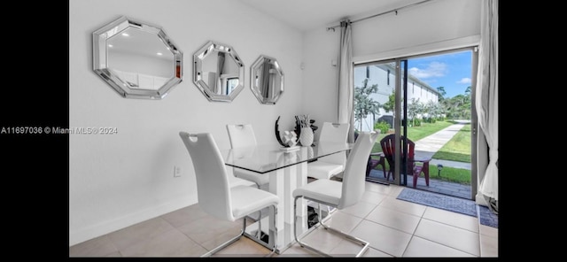 dining room featuring light tile patterned floors