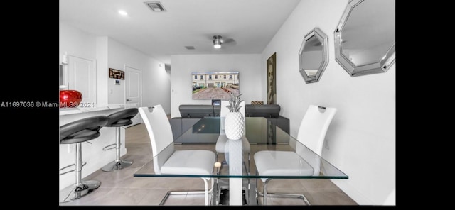 dining room featuring light tile patterned floors