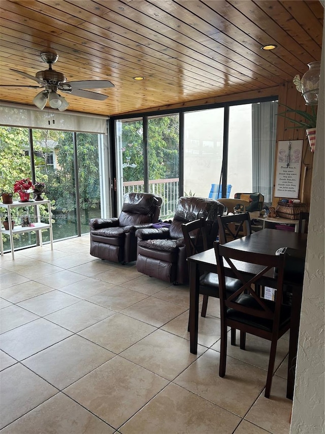 living room with light tile patterned flooring, plenty of natural light, and wooden ceiling