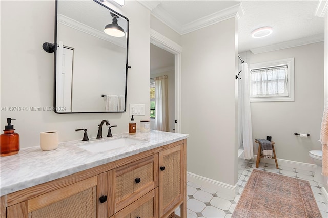 full bathroom featuring a wealth of natural light, crown molding, vanity, and shower / bath combo