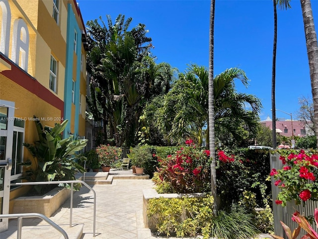 surrounding community featuring a patio area