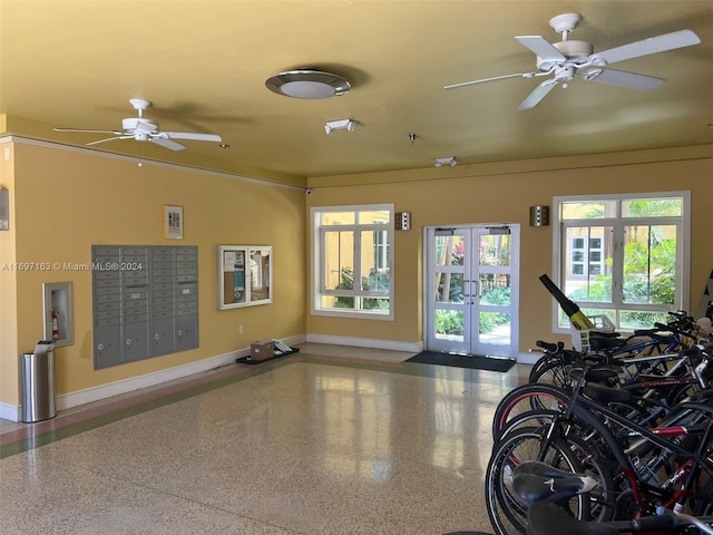 interior space featuring a mail area and french doors