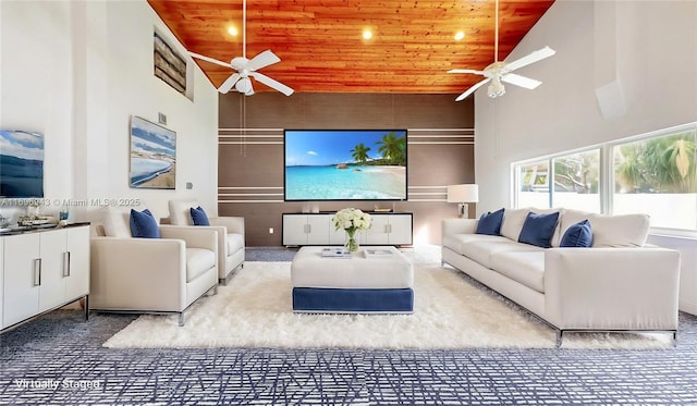 living room featuring wood ceiling, ceiling fan, and high vaulted ceiling