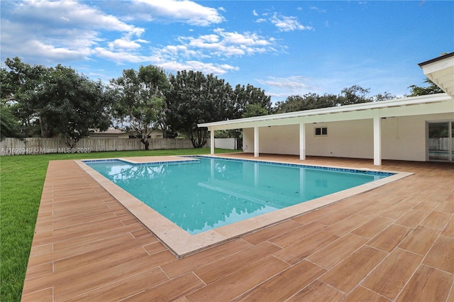 view of swimming pool with a patio