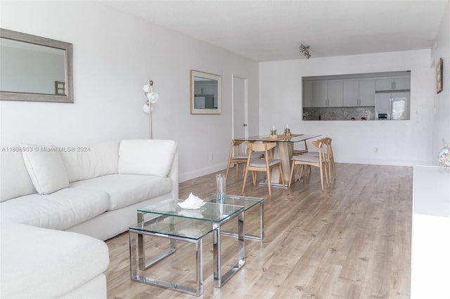 living room with light hardwood / wood-style floors