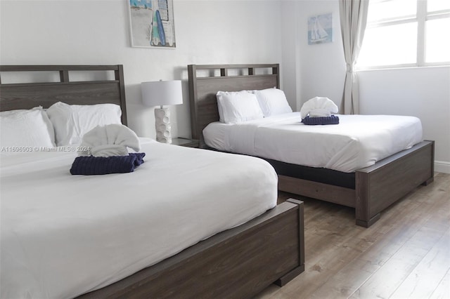 bedroom with light wood-type flooring