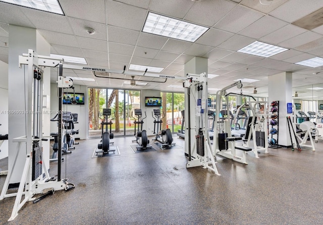 exercise room featuring a paneled ceiling