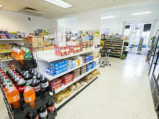 interior space with a drop ceiling