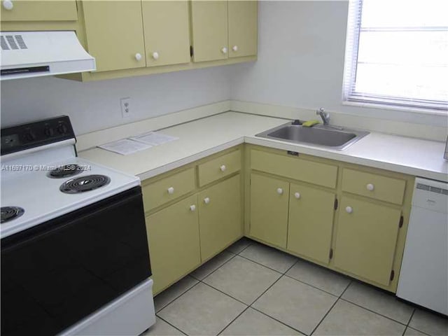 kitchen featuring sink, light tile patterned flooring, exhaust hood, and white appliances