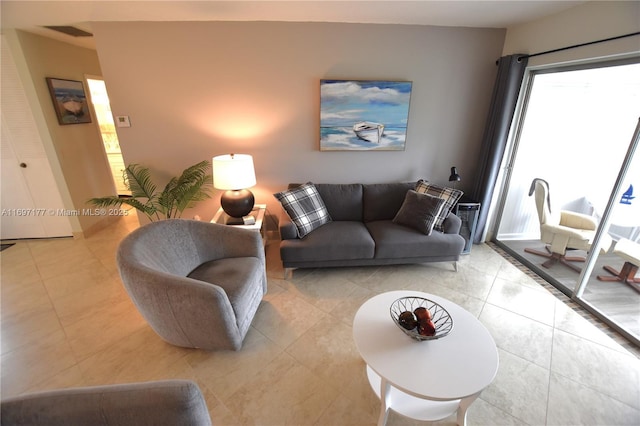 living room featuring light tile patterned flooring