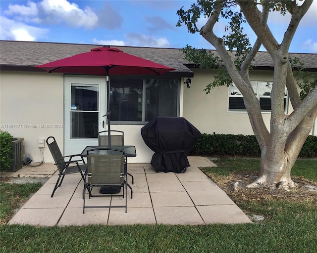 view of patio / terrace with a grill