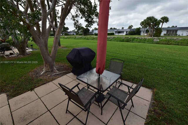 view of patio with a grill