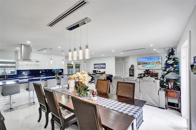 dining area featuring sink