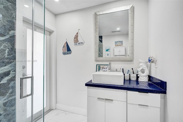 bathroom featuring vanity and a wealth of natural light