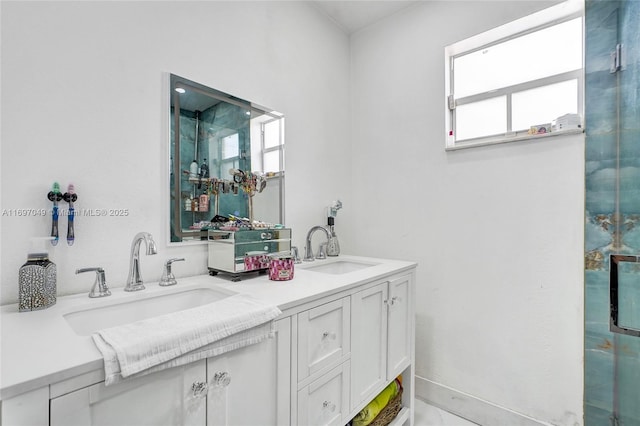 bathroom with vanity and an enclosed shower