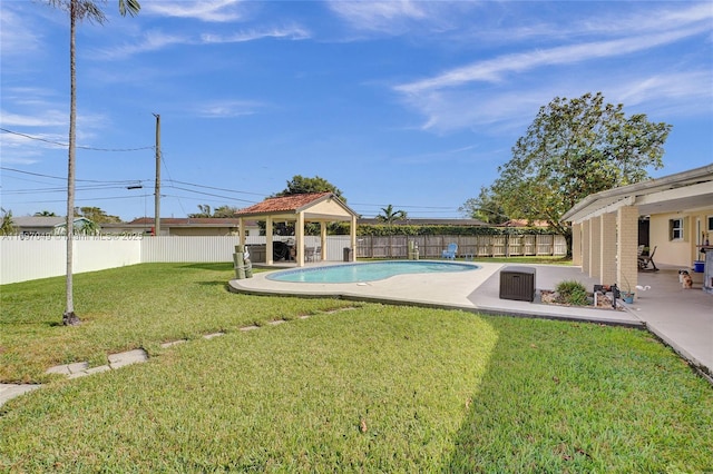 view of pool with a gazebo, a patio, and a lawn