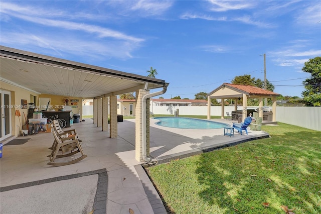 view of swimming pool featuring a gazebo, a yard, and a patio