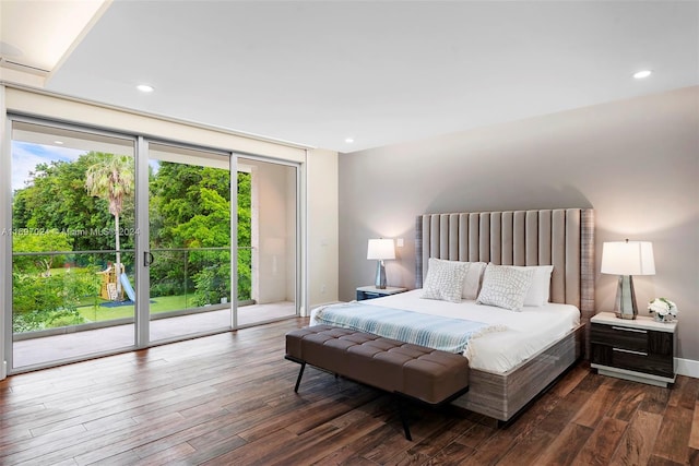 bedroom featuring access to exterior and dark hardwood / wood-style floors