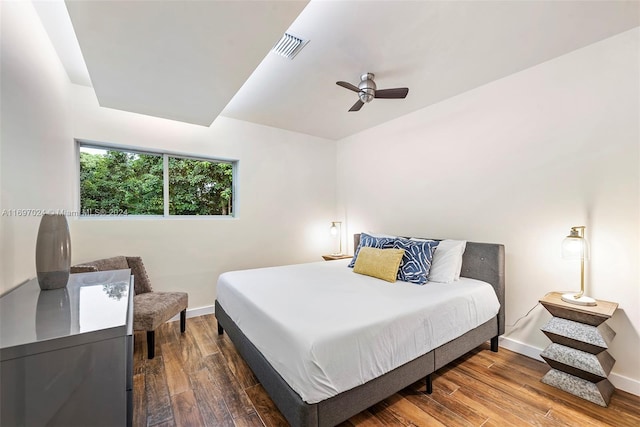 bedroom featuring dark hardwood / wood-style floors and ceiling fan