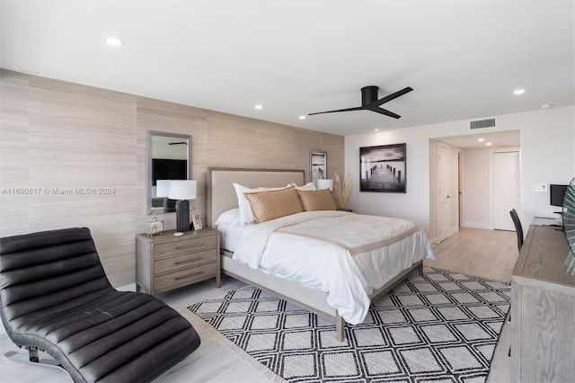 bedroom featuring ceiling fan and light hardwood / wood-style floors