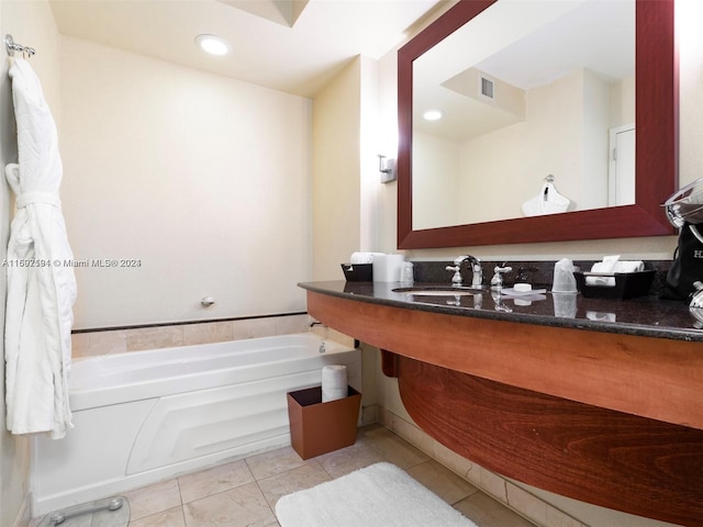 bathroom with a bathing tub and sink