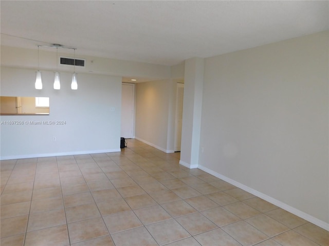 view of tiled spare room