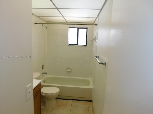 full bathroom featuring tile patterned floors, vanity, toilet, and tiled shower / bath combo