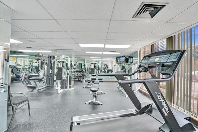 workout area with a drop ceiling