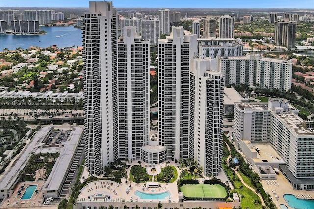 birds eye view of property featuring a water view