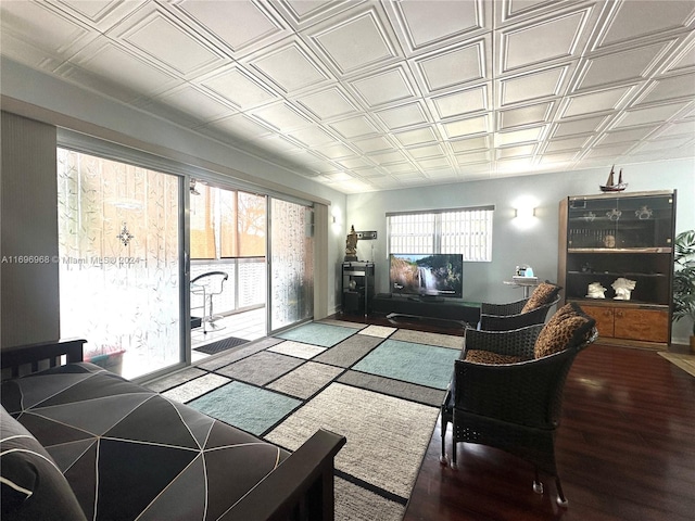 12900 SW 13th St Unit 214E, Pembroke Pines, FL 33027 - living area with wood finished floors and an ornate ceiling