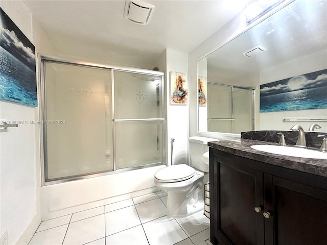 12900 SW 13th St Unit 214E, Pembroke Pines, FL 33027 - bathroom with tile patterned flooring, vanity, and shower / bath combination with glass door