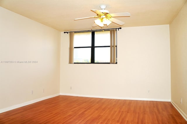 1900 Diana Dr Unit 3E, Hallandale Beach, FL 33009 - unfurnished room featuring light wood-style flooring and baseboards