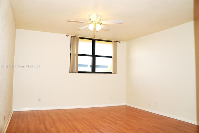 1900 Diana Dr Unit 3E, Hallandale Beach, FL 33009 - unfurnished room with light wood-style flooring and ceiling fan