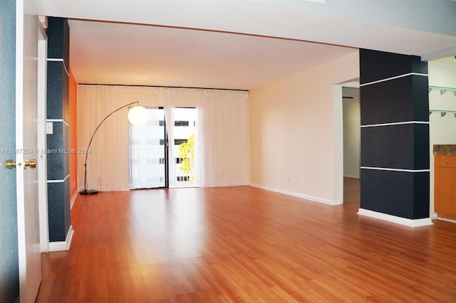 1900 Diana Dr Unit 3E, Hallandale Beach, FL 33009 - unfurnished room featuring light wood-style flooring and baseboards