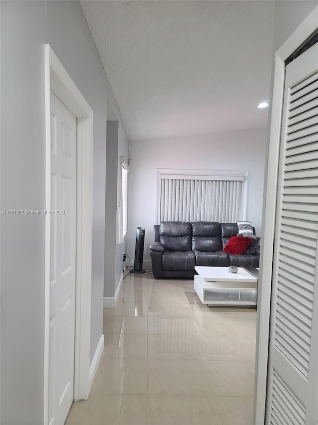 living room with a textured ceiling