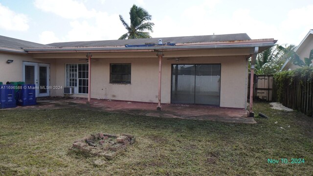 back of house with a patio area, ceiling fan, a yard, and cooling unit