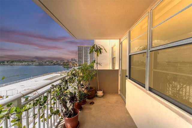 balcony at dusk with a water view