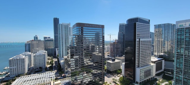 property's view of city with a water view