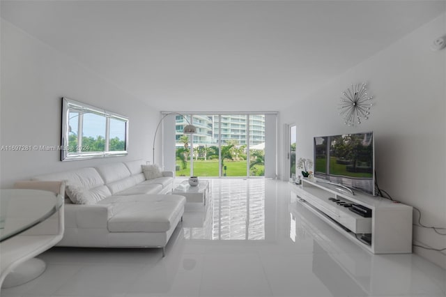 tiled living room with plenty of natural light