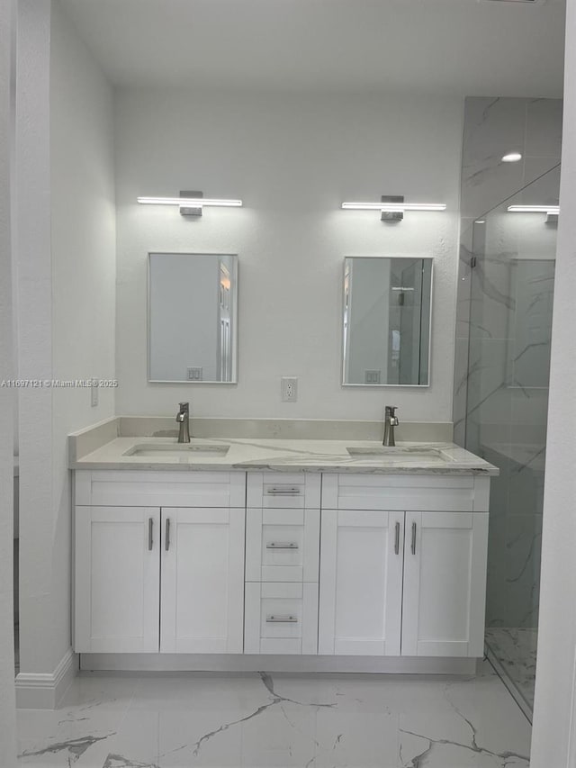 bathroom with vanity and walk in shower