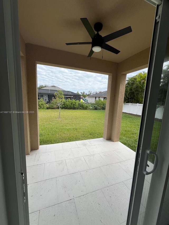 view of patio / terrace featuring ceiling fan