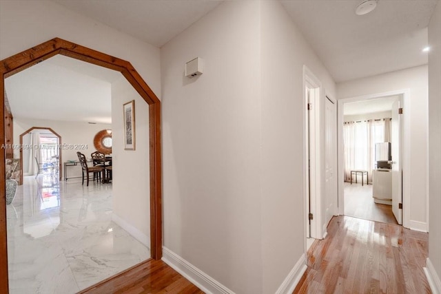 hallway featuring light hardwood / wood-style flooring