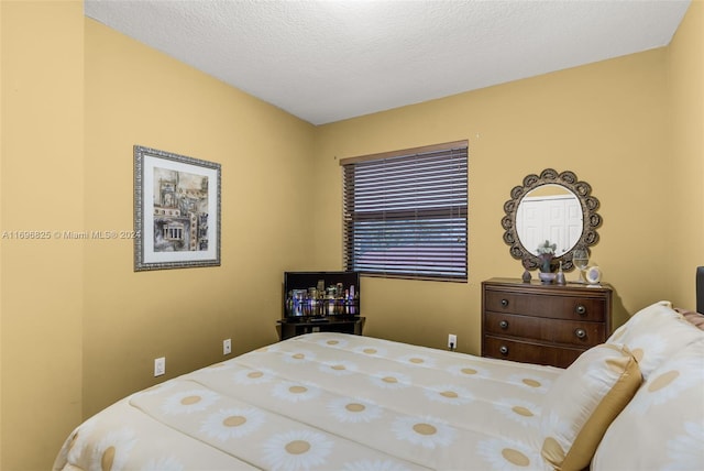 bedroom with a textured ceiling