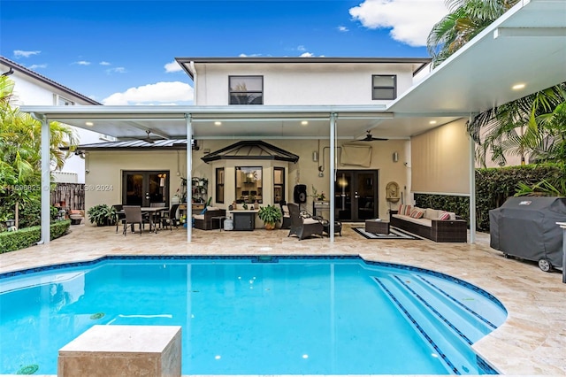 rear view of property with french doors, an outdoor hangout area, a patio, and ceiling fan