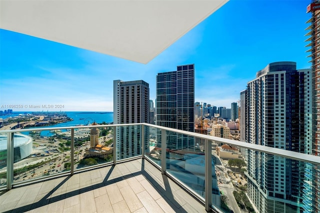 balcony featuring a water view